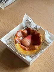 Mini basque burnt cheesecake on top strawberry 