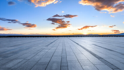 Fototapeta na wymiar Empty square floor with sky clouds at sunset