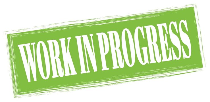 WORK IN PROGRESS text written on green stamp sign.