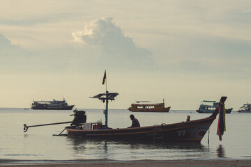 thai fishing boat in cloudy day