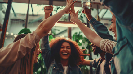 A group of professionals joyfully celebrating in a vibrant office environment