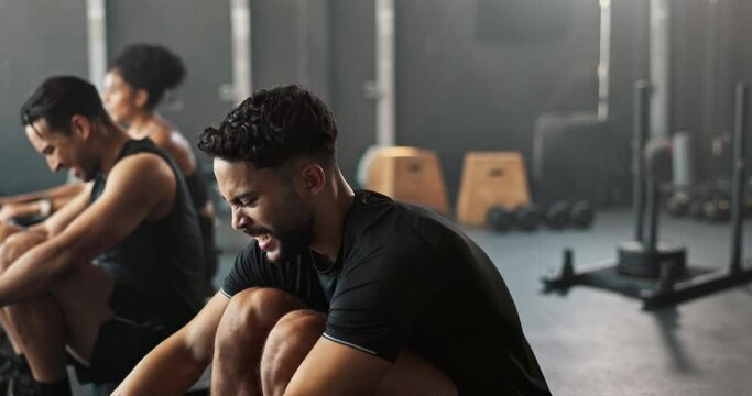 Exercise, rowing machine and face of man with group in gym for wellness, sport or body health together. Friends, club and workout on ergometer for fitness, muscle or portrait of happy person training