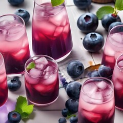 A glass of fizzy blueberry soda with a blueberry3