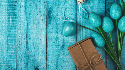 Mockup greeting card, easter eggs on a blue background. Happy Easter
