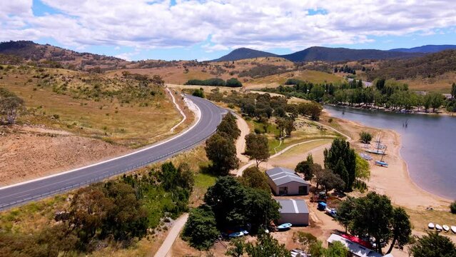 Scenic Drive On The Lakeside Town Of Jindabyne In New South Wales, Australia. Aerial Drone Shot