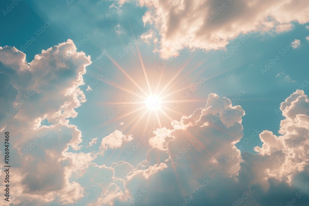 Poster a stunning image of the sun shining through fluffy clouds. perfect for various design projects