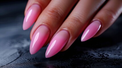 Beautiful pink nails with a trendy design. Perfect for a relaxing manicure or pedicure at a beauty salon. The deep shadows add a touch of elegance.