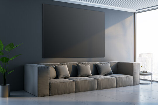 Modern concrete interior with sofa, wooden flooring,window and daylight, city view and plant. Empty black mock up banner on wall. 3D Rendering.