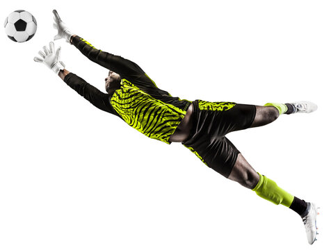Young African man, football player, goalkeeper catching ball in jump during game isolated on transparent background. Concept of sport, game, competition, tournament, active lifestyle
