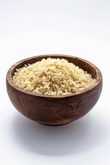 Wooden bowl filled with rice, versatile image for food and cooking concepts