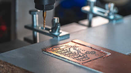 machine with numerical control CNC carries out milling of printed circuit boards, Circuit...
