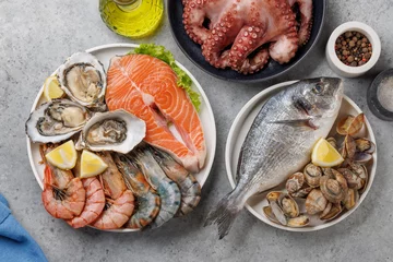 Fotobehang Seafood Platter Delight: Shrimps, Salmon, Oysters Galore © karandaev