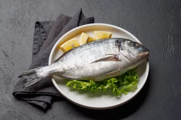 Foto op Aluminium Fresh dorado fish, ready to cook © karandaev