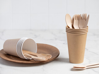Eco friendly paper utensils. Zero waste concept. Plastic free concept. Paper dishes. Paper glass.