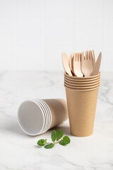 Eco friendly paper utensils. Zero waste concept. Plastic free concept. Paper dishes. Paper glass.