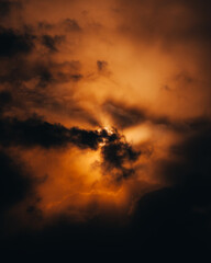 Heavenly rays pierce the cloud cover, creating a feeling of hope. The bright rays of the sun break through the clouds, creating a dramatic effect. Shine.