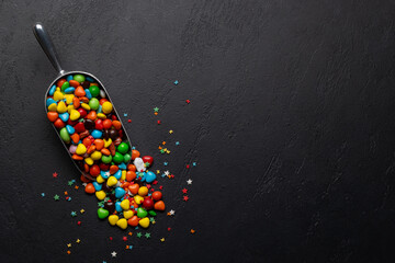Various colorful candies scoop