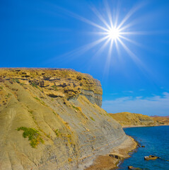 rocky sea coast  at bright summer sunny day