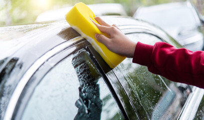 Hand hold sponge clean the car