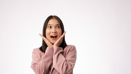 Young lovely Asian woman surprised and wow face happy positive pose with copy space as advertising on white background