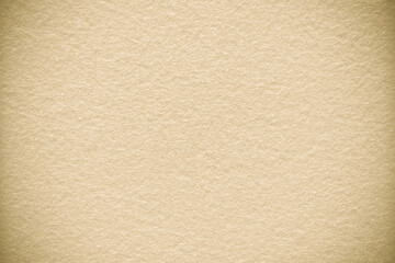 Pale brown fabric background texture. Brown yellow felt abstract background with copy space for...