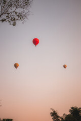 Hot air balloons in the sky at sunrise