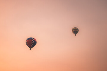 Hot air balloons in the sky at sunset