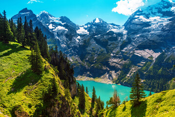 Beautiful magical landscape with the lake Oeschinensee in the Swiss Alps, near Adelboden, Switzerland, Europe