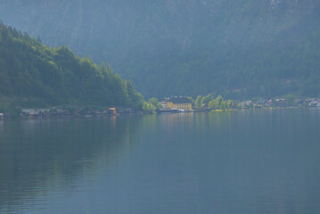 Hallstatter lake near Hallstatt village with cloudy sky in Austrian Alps. Natural colorful evening...