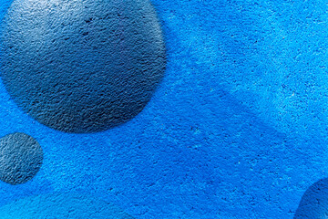 urban street wall aerosol graffiti painting with drawing of colorful round bubbles and balls in space