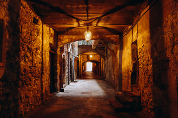 The Rue Obscure of Villefranche-sur-Mer, a 130-meter covered street dating from 1260, located along...