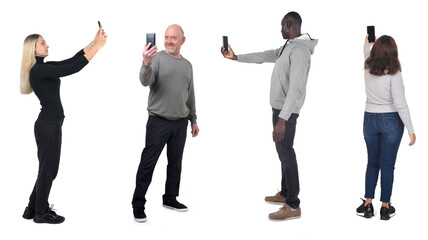 group of people taking a self-portrait with smartphone on white background - 787014836