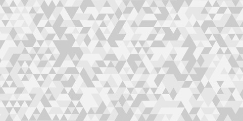 	
Vector geometric seamless technology gray and white triangle background. Abstract digital grid light pattern white Polygon Mosaic triangle Background, business and corporate background.