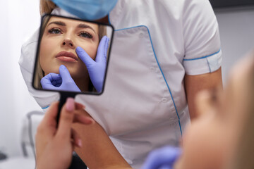 Woman having facelifting procedure in beauty salon - 787018296