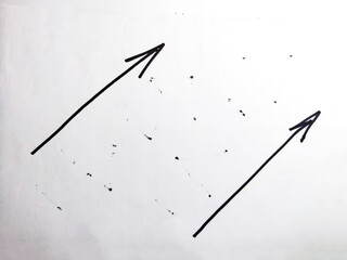 Hand drawn black marker arrow and a scattering of dots.. Concept of business, choosing direction,...