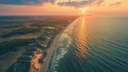 Curonian Spit wth Baltic sea coastline on sunset. Kurshskaya kosa national park near Zelenogradsk. Kaliningrad region. Aerial view - obrazy, fototapety, plakaty
