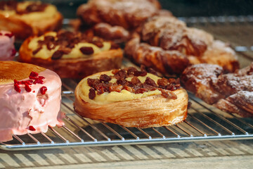 Close-up of fresh and beautiful french pastries in a bakery showcase