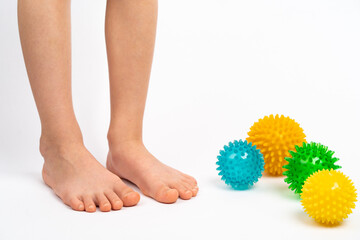 colored needle balls for massage and physiotherapy on a white background with the image of...