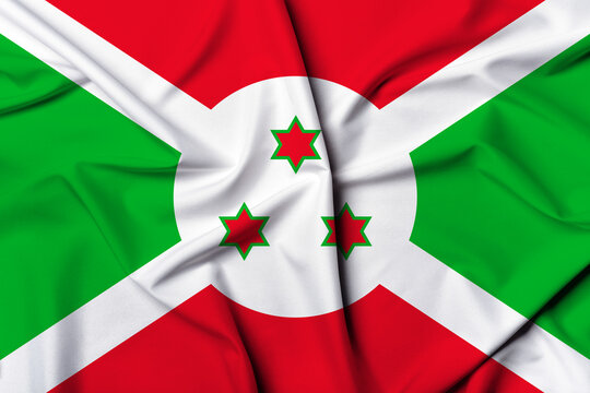 Beautifully waving and striped Burundi flag, flag background texture with vibrant colors and fabric background