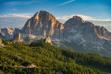 Sunrise light on mountain peaks in summer