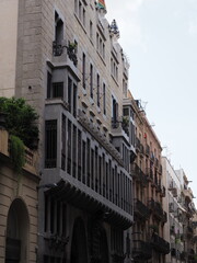 Facade of palace in European Barcelona city in Spain - vertical