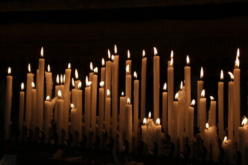 candles in church with black background