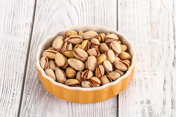 Salted tasty pistachio nuts heap