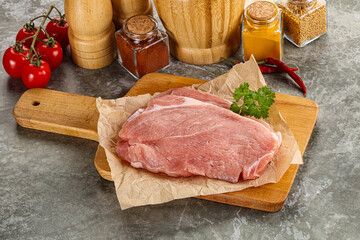 Raw pork schnitzel for cooking