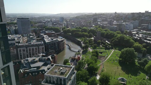 Aerial footage of the Castle Park, St Peter's Church and Castle Bridge in Bristol, England, UK