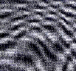 Texture of dark blue fabric with white loops.