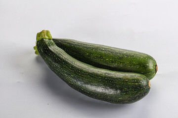 Raw young small green zucchini
