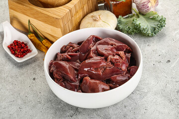 Raw uncooked chicken liver in the bowl