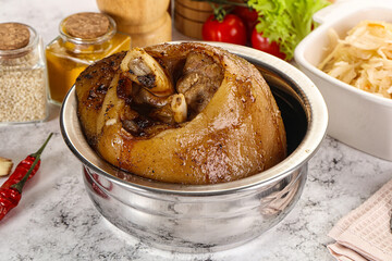 Baked pork knee with spices