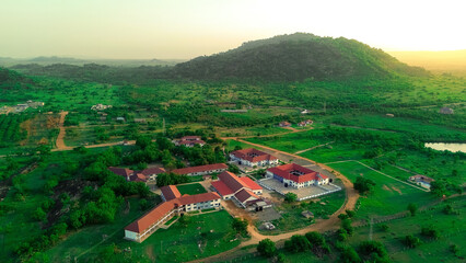 view of the village with sun setting behind mountain